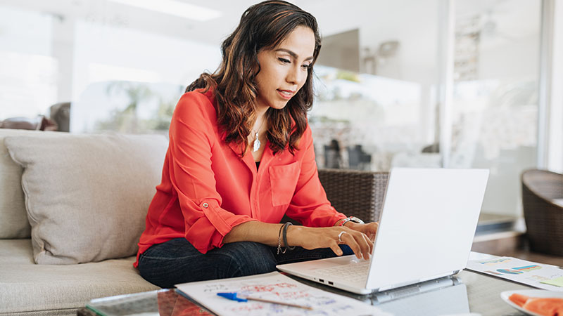 Businesswoman working from home.