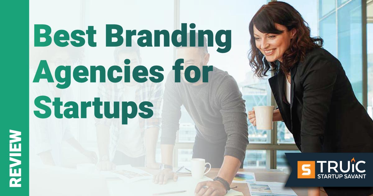 Smiling colleagues working at a branding agency.