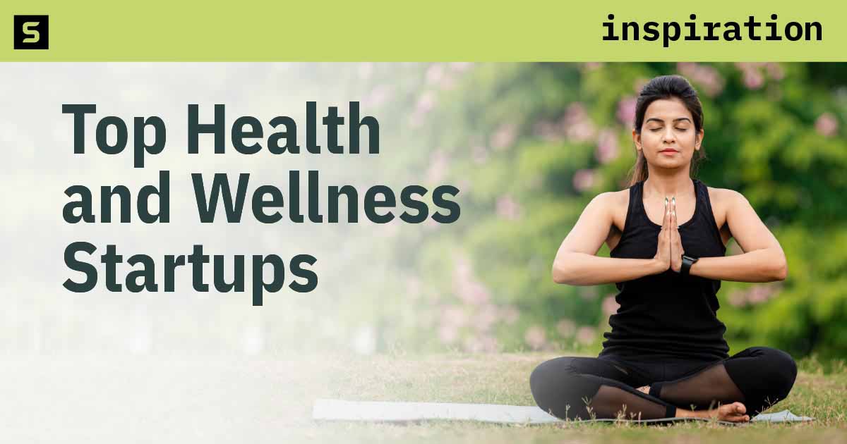 Person sitting in a yoga pose.